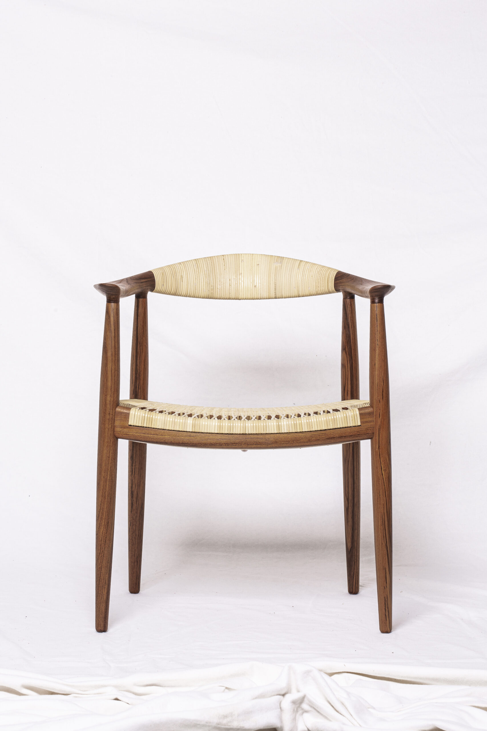 pp501 Round Chair in a 75th anniversary edition in teak wood with woven seat and back.